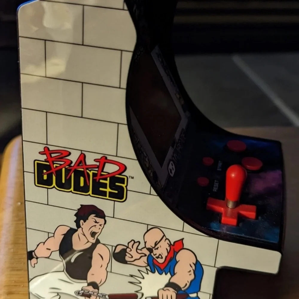 Arcade compact handheld